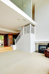 Bright empty house interior with loft