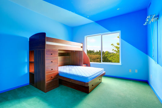 Bright Blue Kids Room With Loft Bed