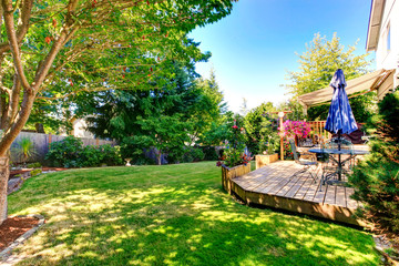 Walkout deck with patio table and umbrella