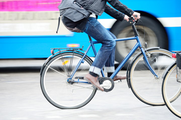 Man on bike in traffic