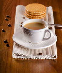 Coffee cup and cookies
