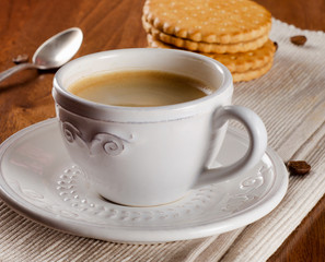 Coffee cup and cookies