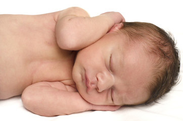 Beautiful innocent newborn sleeping. Adorable little boy 