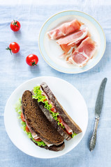sandwich with rye bread and prosciutto