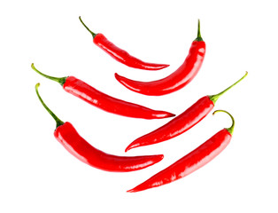 Top view of symetrical red peppers isolated white background