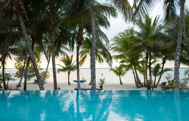 swimming pool on tropical beach