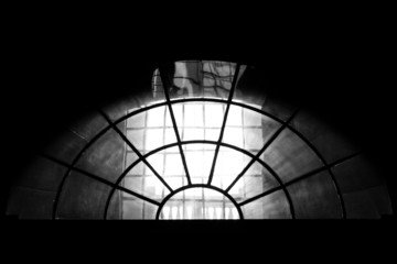 Semi round church window on black and white