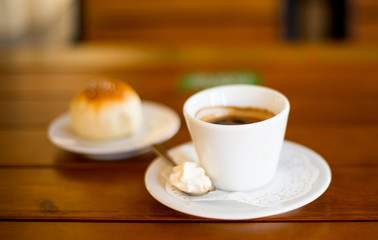 Coffee Cup and Bread Roll. Continental Breakfast.