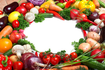 decorative pattern of fresh vegetables on white background