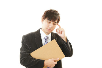 頭痛を訴えるビジネスマン