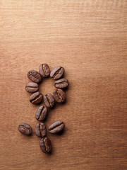 Coffee crop beans on wood texture