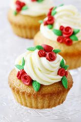 Wedding reception cupcakes decorated with sugarcraft red roses