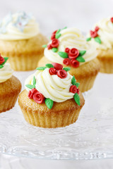Wedding reception cupcakes decorated with sugarcraft red roses