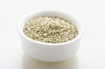 Dry rosemary close up on white