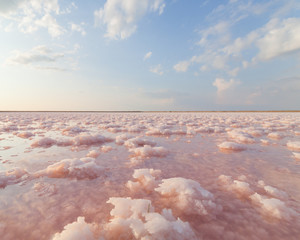 Pink salt lake, where salt is mined for food. - 69407129