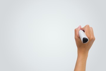 Female hand writing with marker