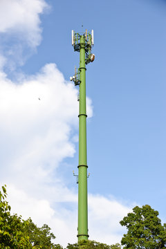 green communication towers in the park