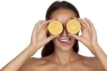 Beautiful sexy young woman with perfect healthy skin with citrus