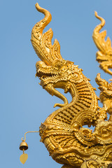 Fototapeta na wymiar Sculpture dragon at Wat Sri Pan Ton
