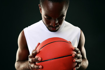 Portrait of a black man with backetball ball