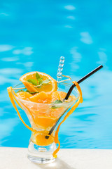 Orange Mojito by the swimming pool