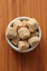 Brown cane sugar in a bowl