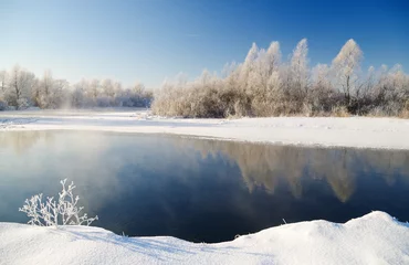 Vlies Fototapete Winter winter scene with river background.