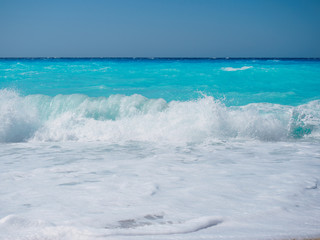 wild beach with rocks in water. Island Lefkada, Greece