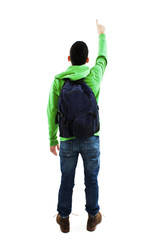 Young student with backpacks pointing at wall. Back view