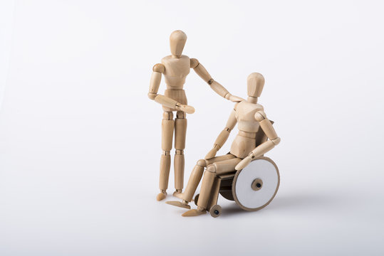 Rollstuhlfahrer und Arbeitskollege