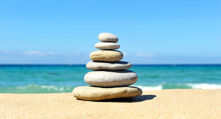 Pyramid of stones, beach, zen