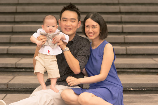 Young Asian Chinese family with 5 month old son