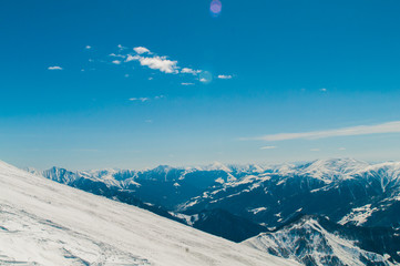 Snow mountains on bright winter day