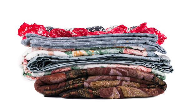 Stack Of Beautiful Handmade Quilts.