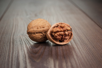 walnuts on the brown wooden table