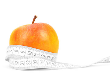 Apples measured the meter on a white