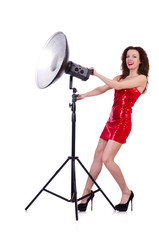 Woman in red dress posing in the studio