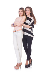 Two female friends isolated on the white