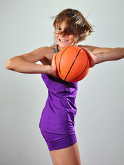 child exercising with ball