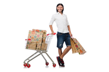 Man shopping with supermarket basket cart isolated on white