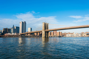 Fototapeta premium Brooklyn bridge in New York on bright summer day