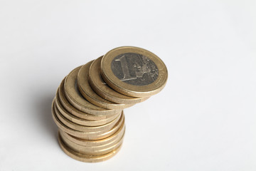 Euro coins with one euro with