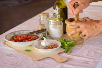 Cooking sauce using mortar and pestle