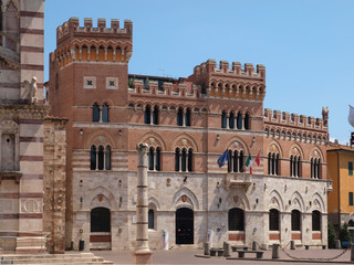 Palazzo Aldobrandeschi in Grosseto, Italy. - obrazy, fototapety, plakaty