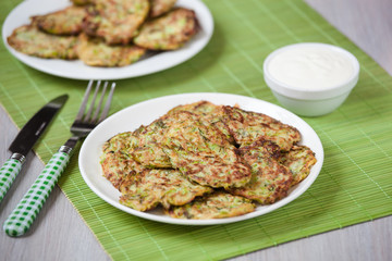 Green pancakes with zucchini and herbs