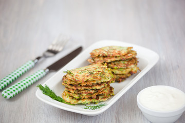 Green pancakes with zucchini and herbs