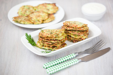 Green pancakes with zucchini and herbs