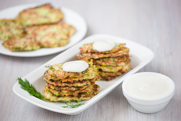 Green pancakes with zucchini and herbs