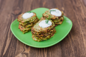 Green pancakes with zucchini and herbs