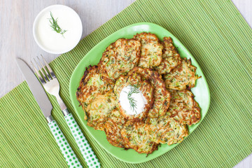 Green pancakes with zucchini and herbs